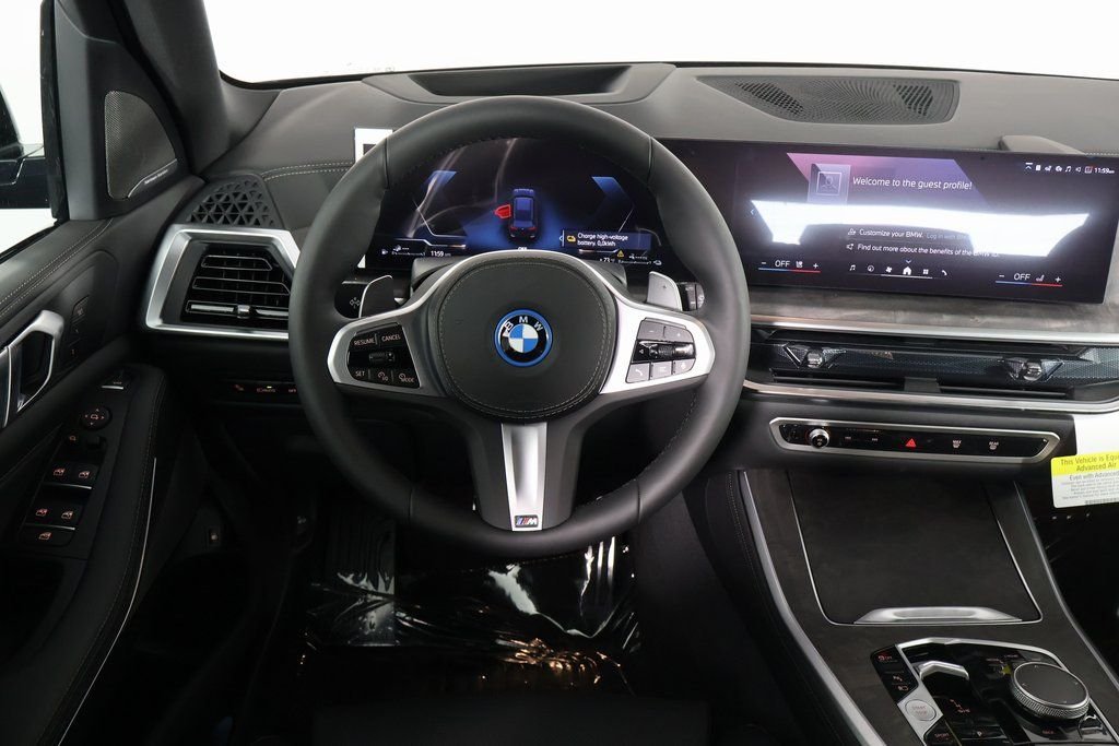 New 2026 Carbon Black Metallic BMW xDrive50e image 3