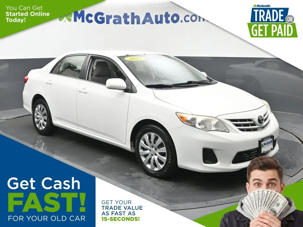 Used 2013 White Toyota LE image 1