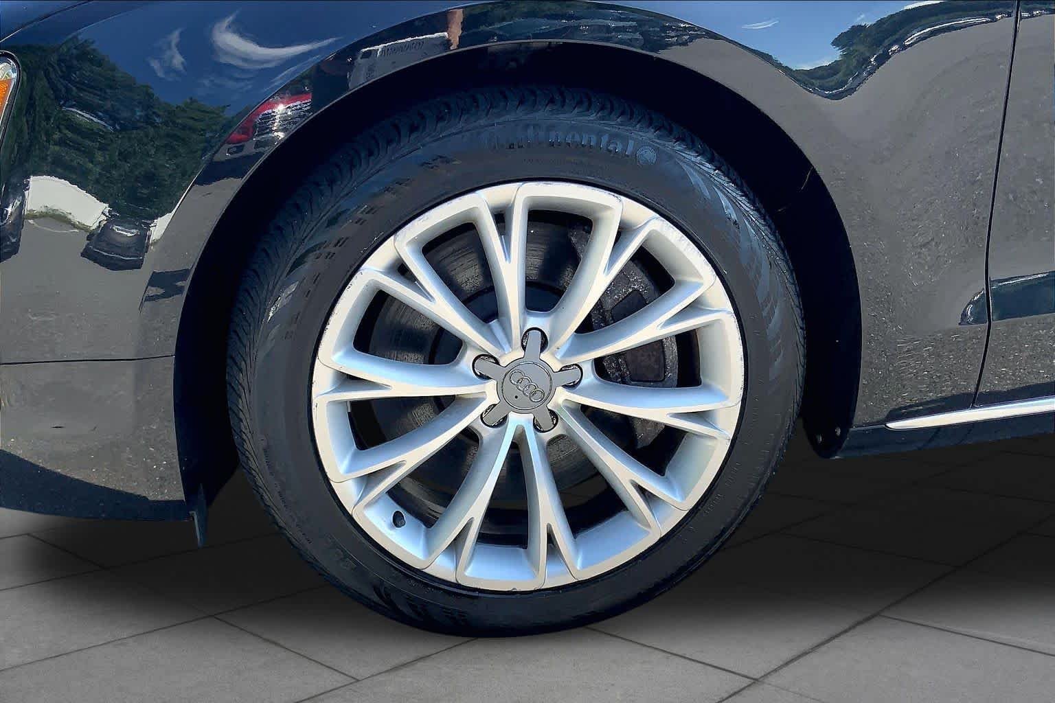 Used 2012 Emerald Black Metallic Audi  image 11