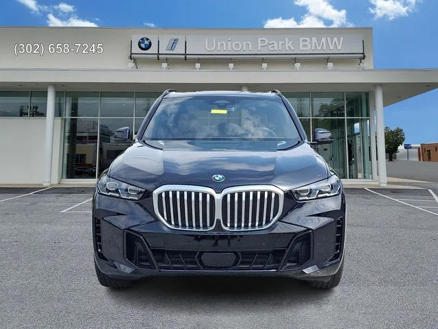 Certified Used 2024 Carbon Black Metallic BMW xDrive40i image 2