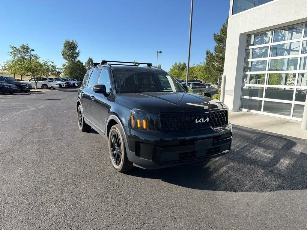 Used 2024 Ebony Black Kia EX X-Line image 7