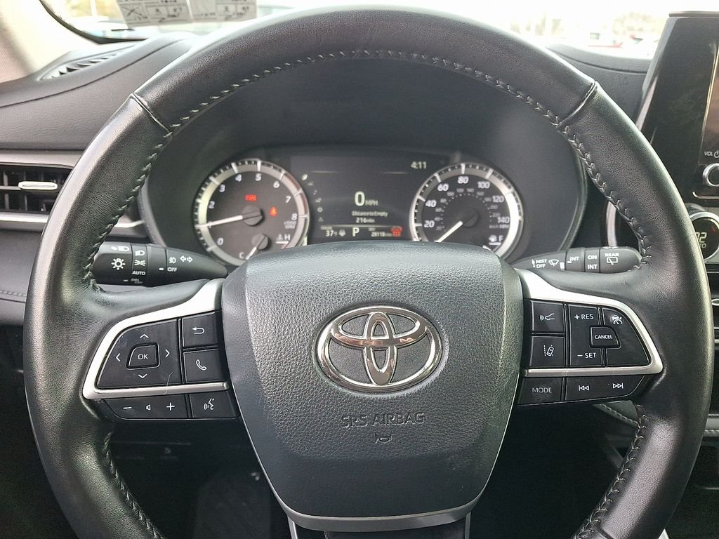Used 2024 Midnight Black Metallic Toyota LE image 19