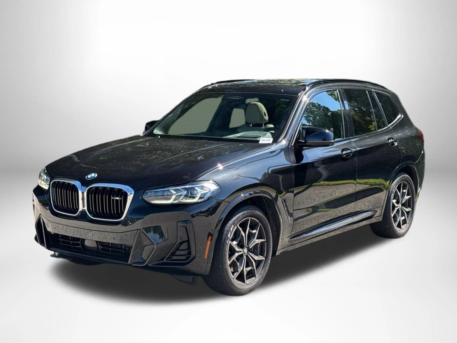 Used 2022 Black Sapphire Metallic BMW M40i image 1