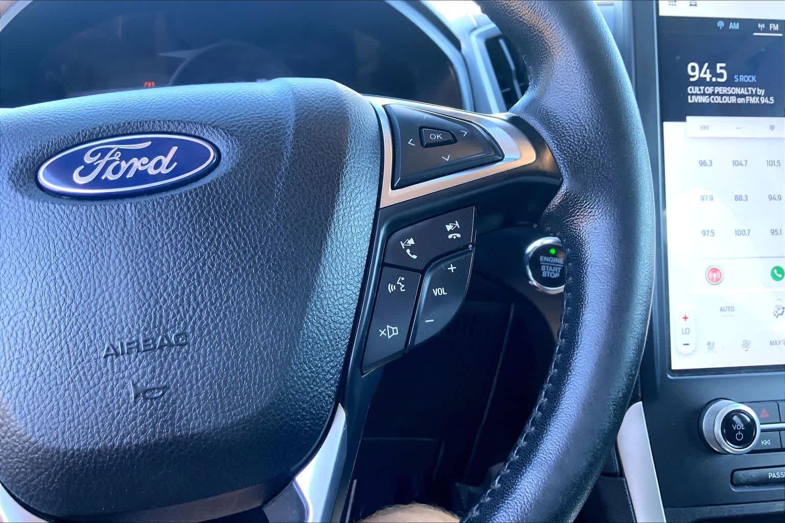 Certified Used 2022 Agate Black Metallic Ford SEL image 25