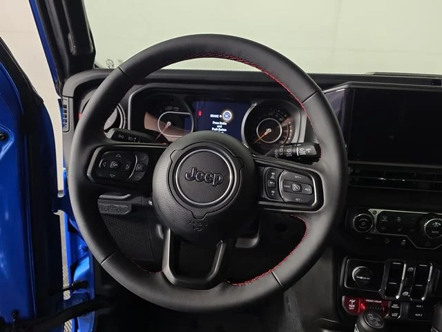 Used 2024 Hydro Blue Pearl Coat Jeep Rubicon X image 13