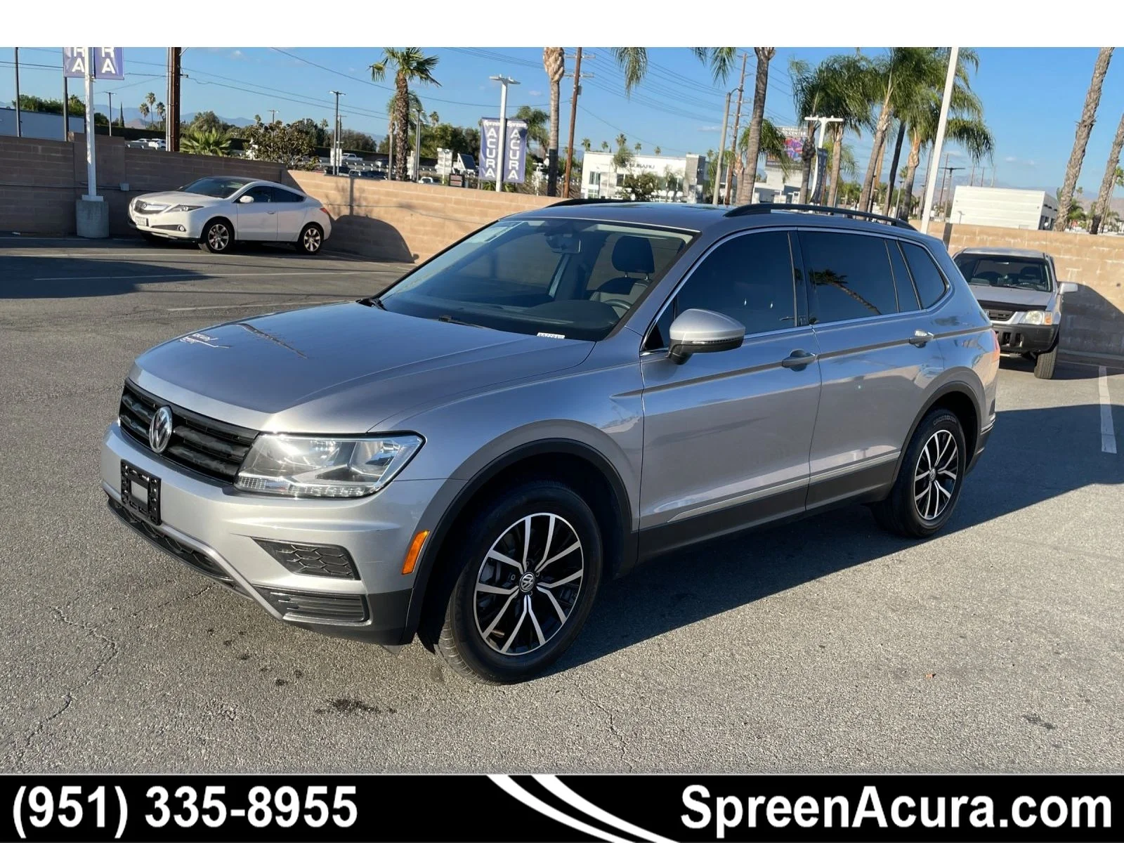 Used 2021 Pyrite Silver Metallic Volkswagen SE image 1