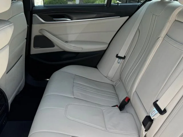 Used 2023 Black BMW M550i xDrive image 26