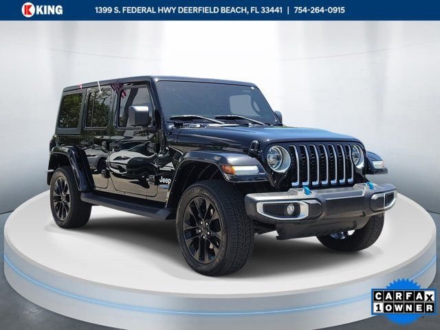 Used 2022 Black Jeep Unlimited Sahara 4xe image 1