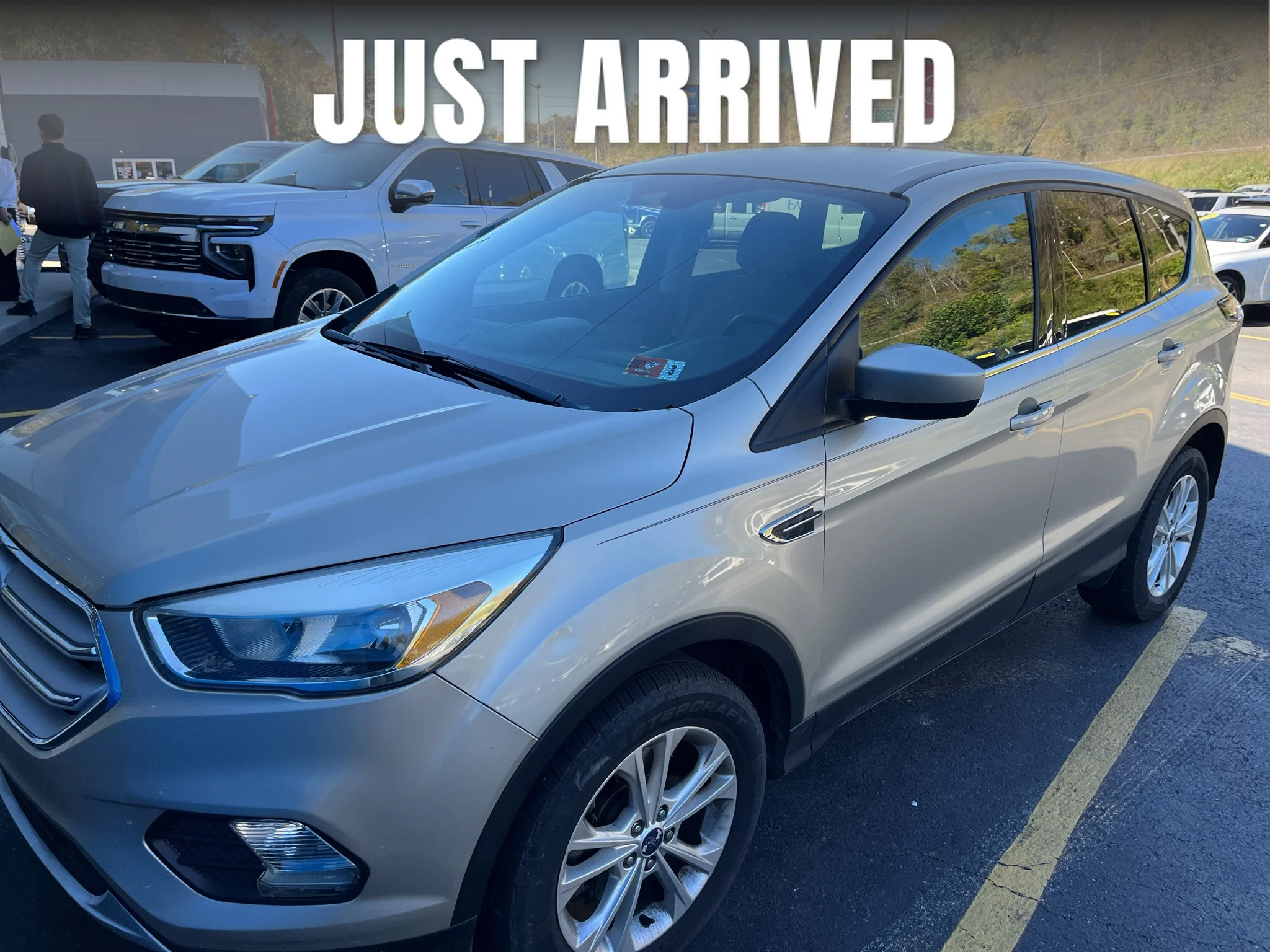 Used 2017 White Gold Metallic Ford SE image 1