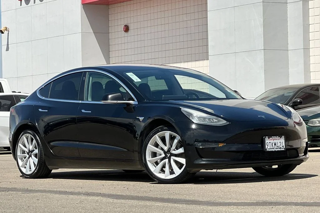 Used 2018 Tesla Model 3 Long Range with VIN 5YJ3E1EA7JF005883 for sale in Hanford, CA