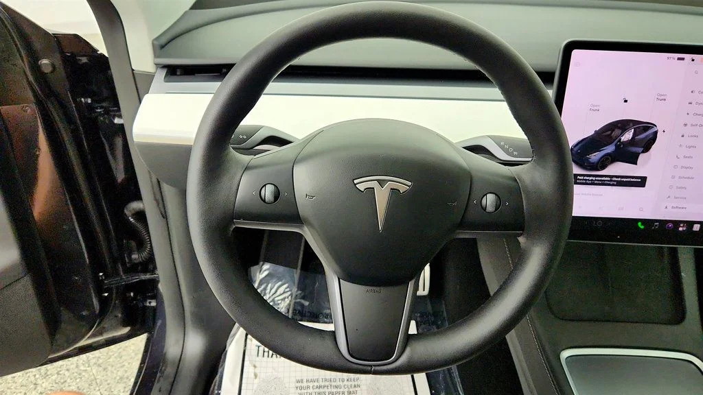 Used 2024 Stealth Grey Tesla Performance AWD w/ White & Black Interior image 13