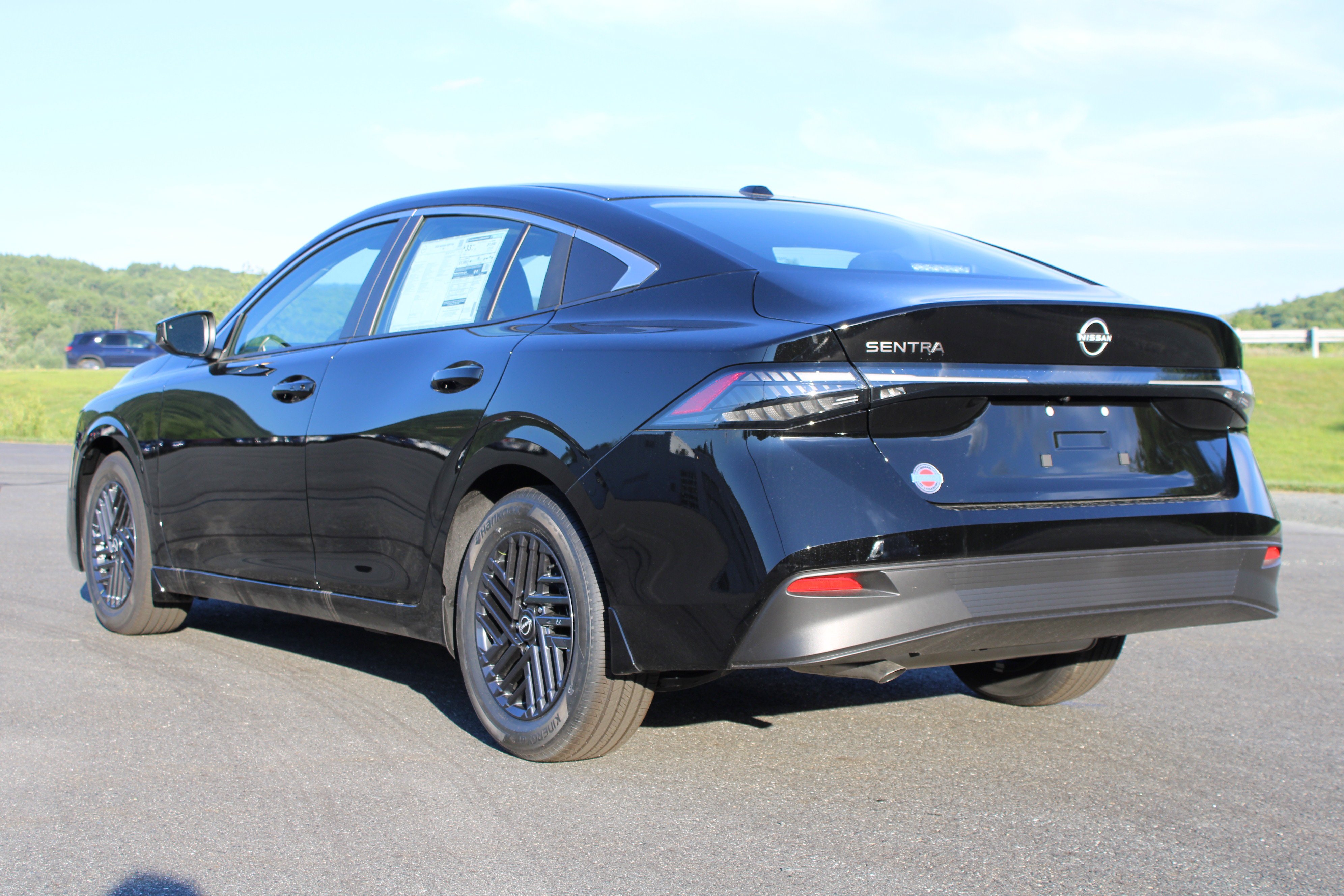 New 2026 Super Black Nissan SV image 6