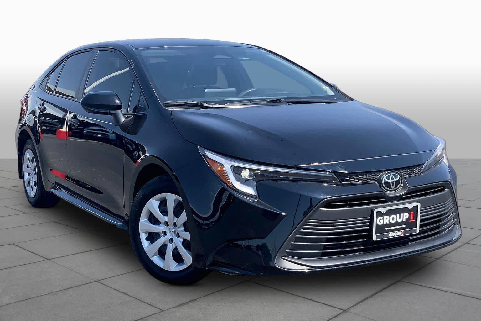 Used 2026 Midnight Black Metallic Toyota Hybrid LE image 3
