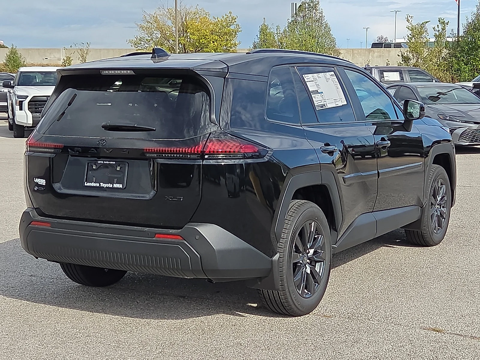 New 2026 Midnight Black Metallic Toyota XLE Premium image 4