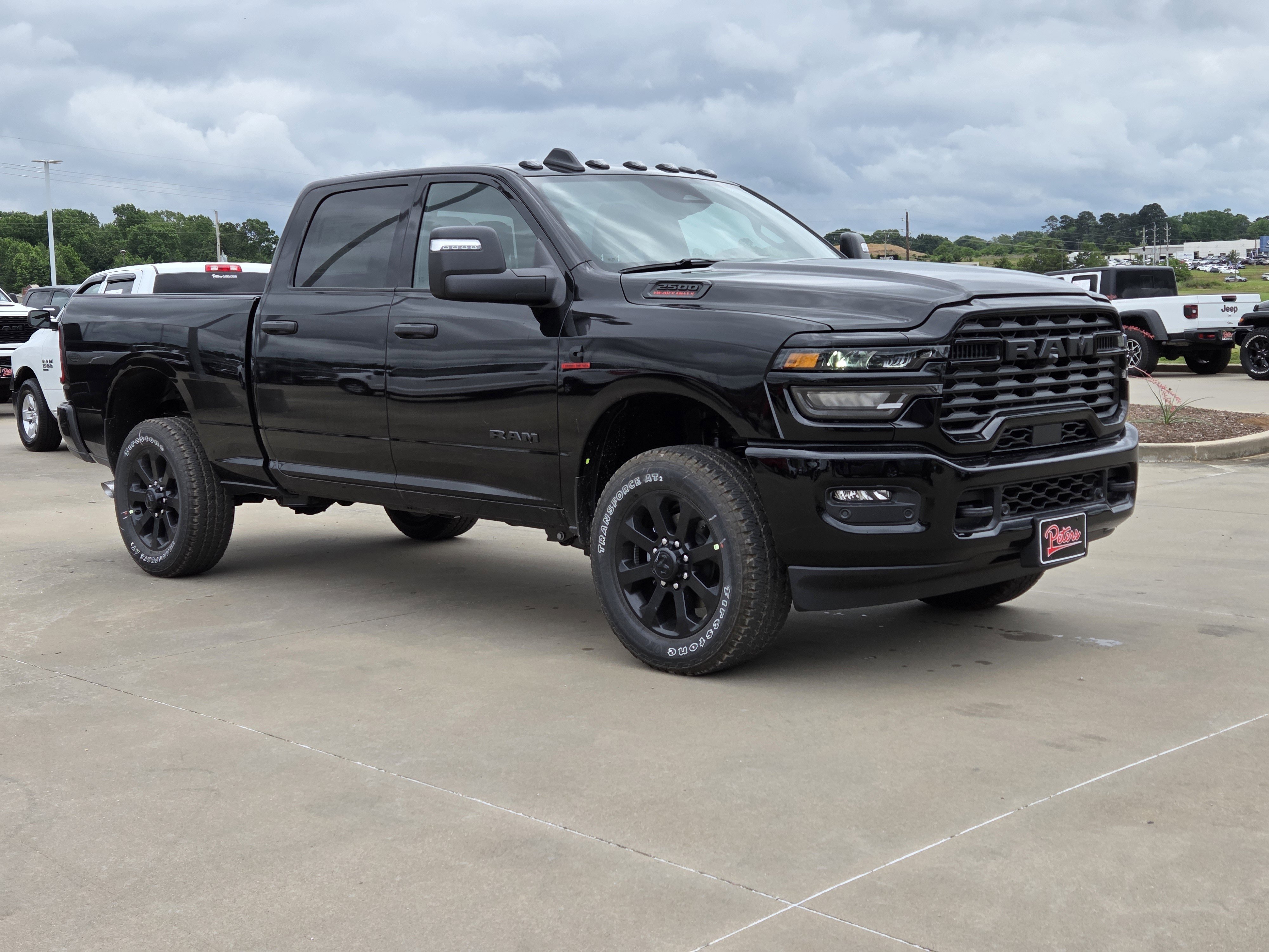 New 2026 Diamond Black Crystal Pearlcoat Ram Lone Star image 1