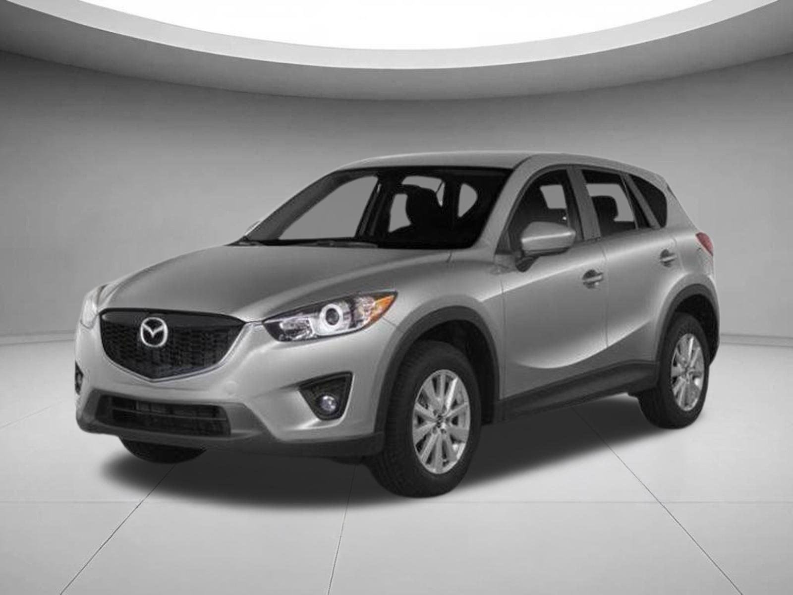 Used 2015 BLUE REFLEX MICA MAZDA TOUR image 1