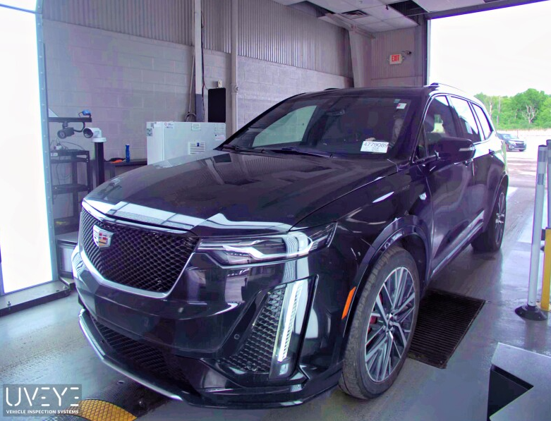 Used 2024 Black Cadillac Sport image 1