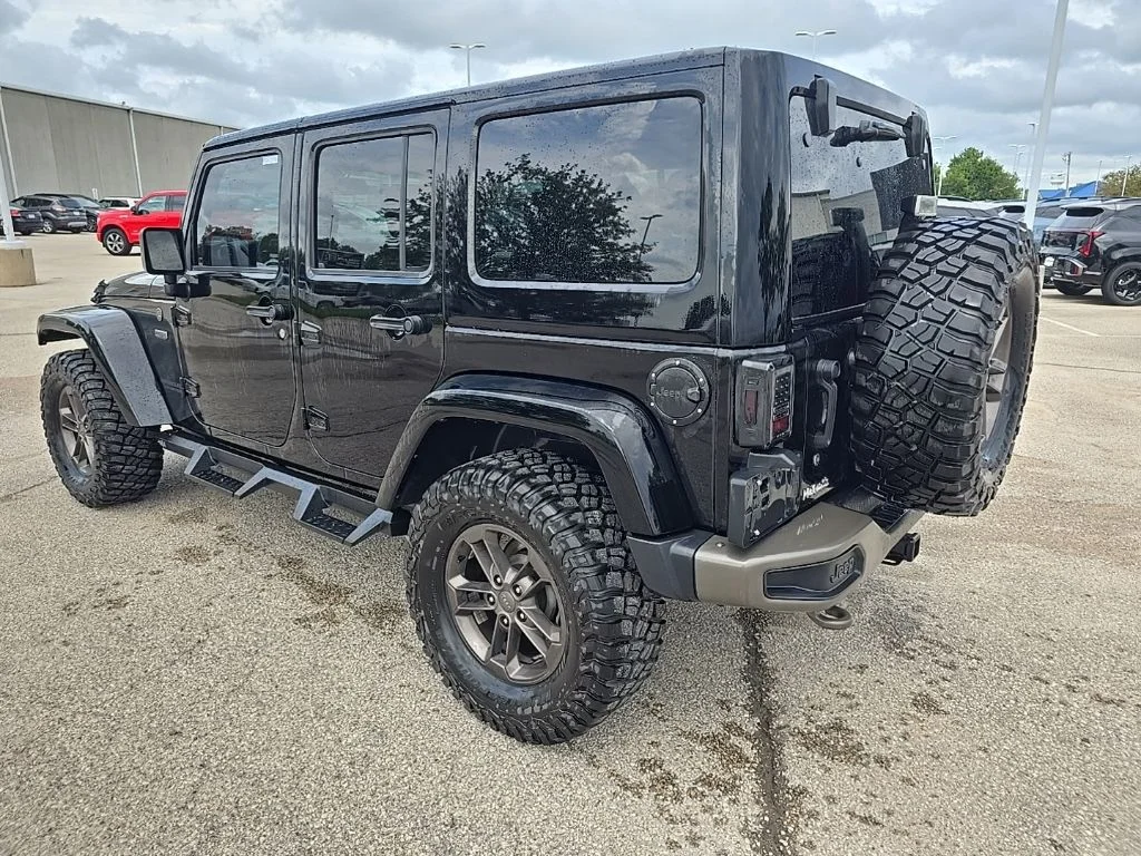 Used 2016 Black Jeep Unlimited Sahara image 5