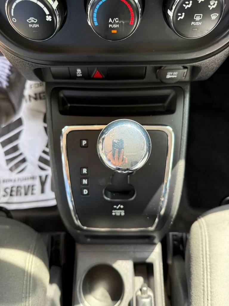 Used 2015 White Jeep Sport image 15