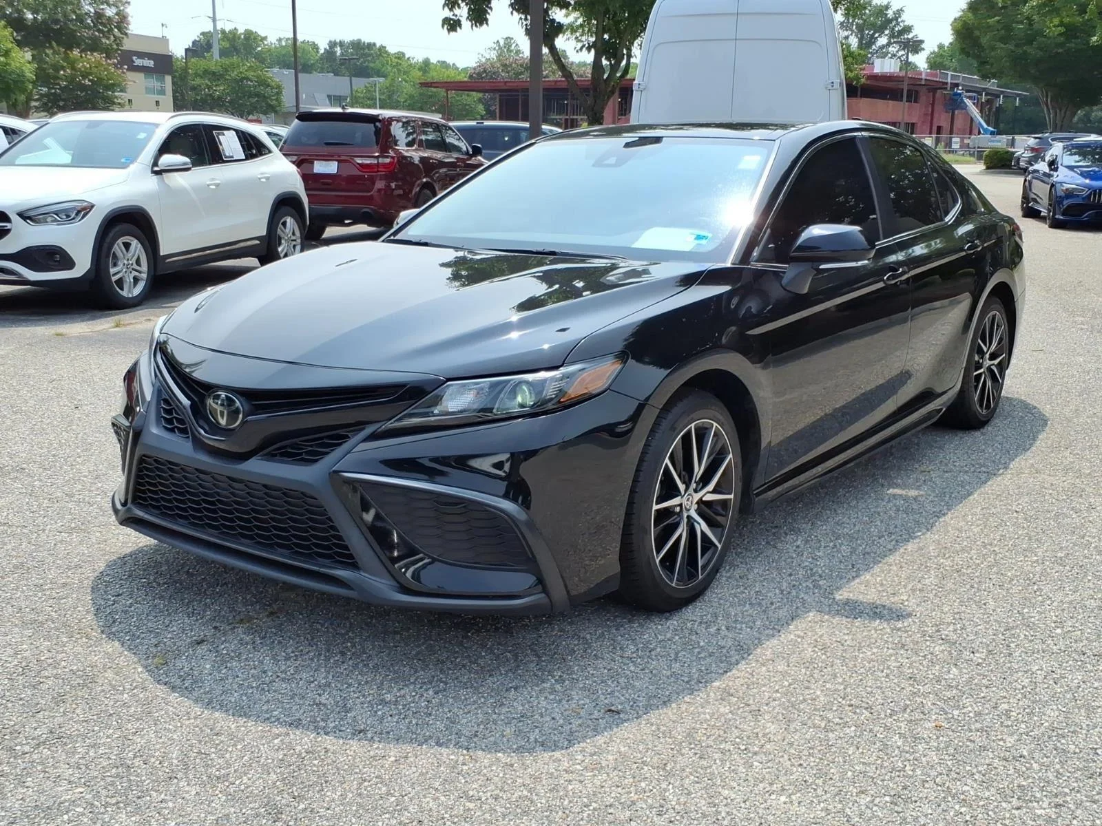 Used 2023 Midnight Black Metallic Toyota SE image 1