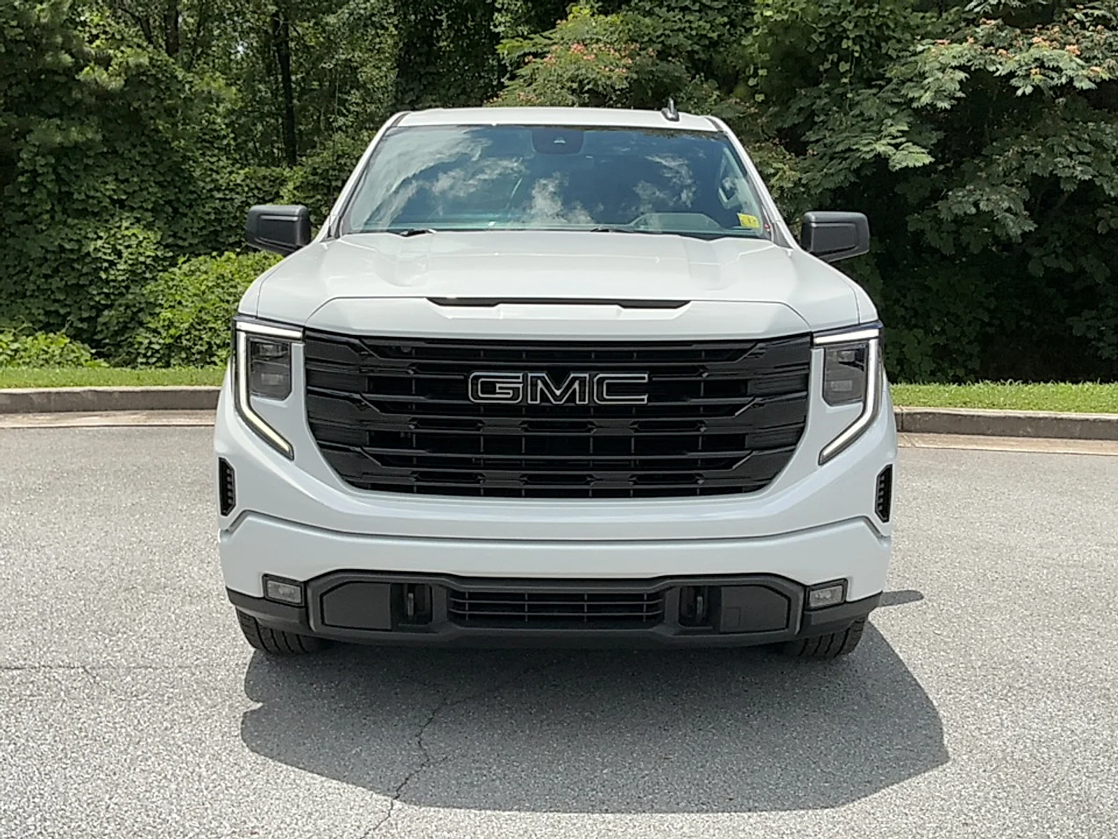 Used 2024 Summit White GMC 4WD Crew Cab Short Box Elevation with 3SB image 17