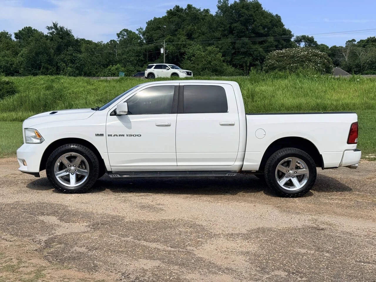 Used 2012 White RAM Sport 4x4 4dr Crew Cab 5.5 ft. SB Pickup image 2