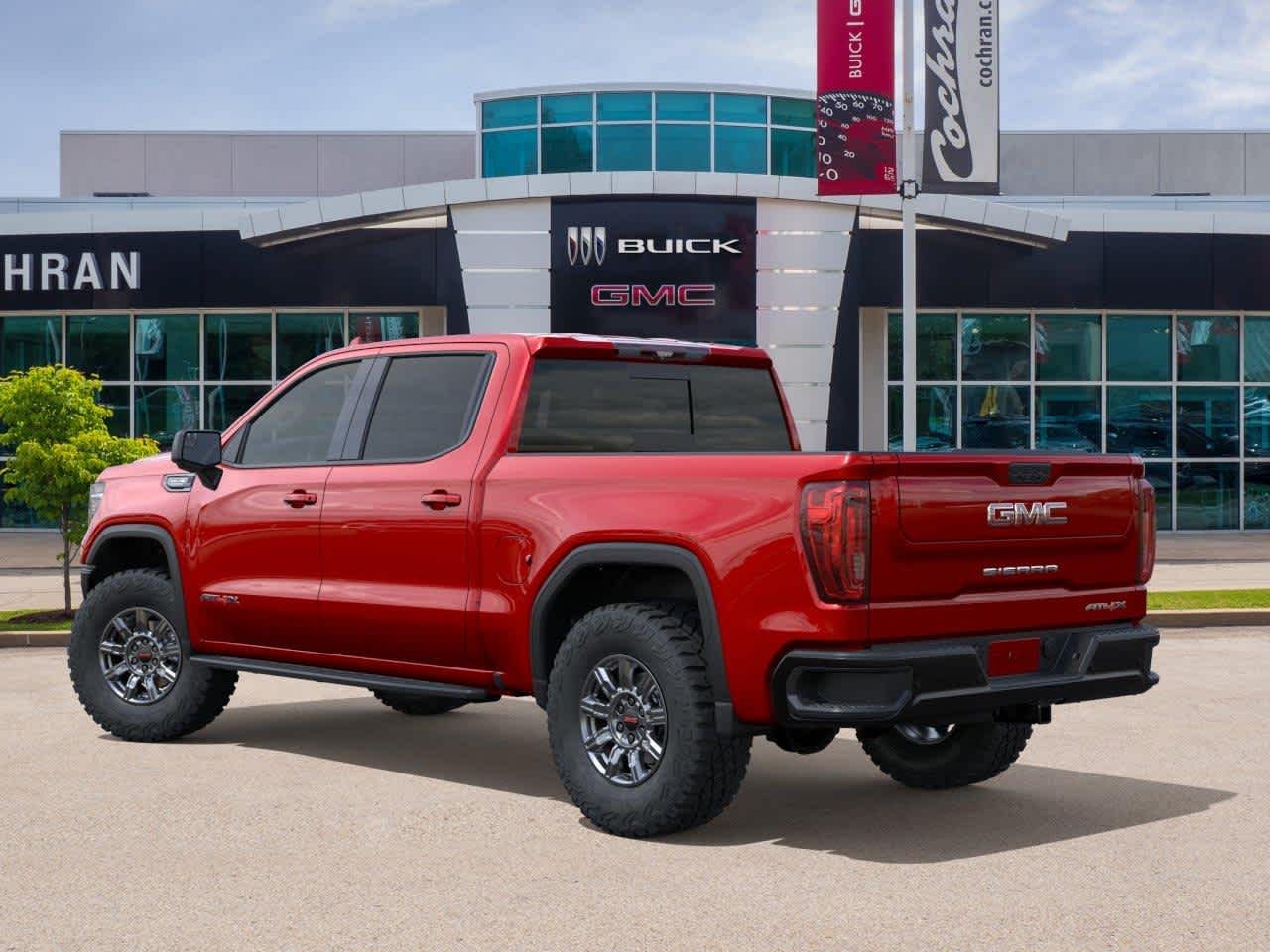 New 2026 VOLCANIC RED TINTCOAT GMC AT4X image 3