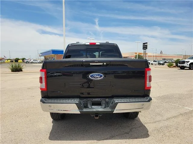 Used 2023 Agate Black Metallic Ford Lariat 4x4 SuperCrew Cab 6.5 ft. box 157 in. WB image 3