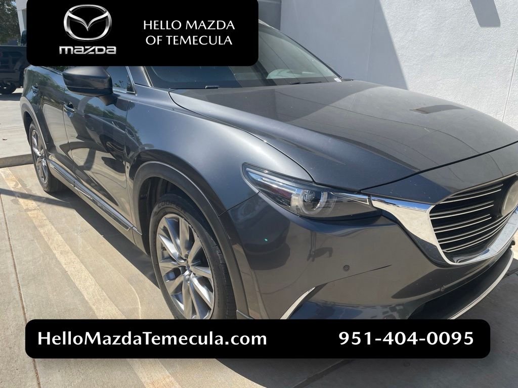 Used 2019 Machine Gray Mazda Grand Touring image 1