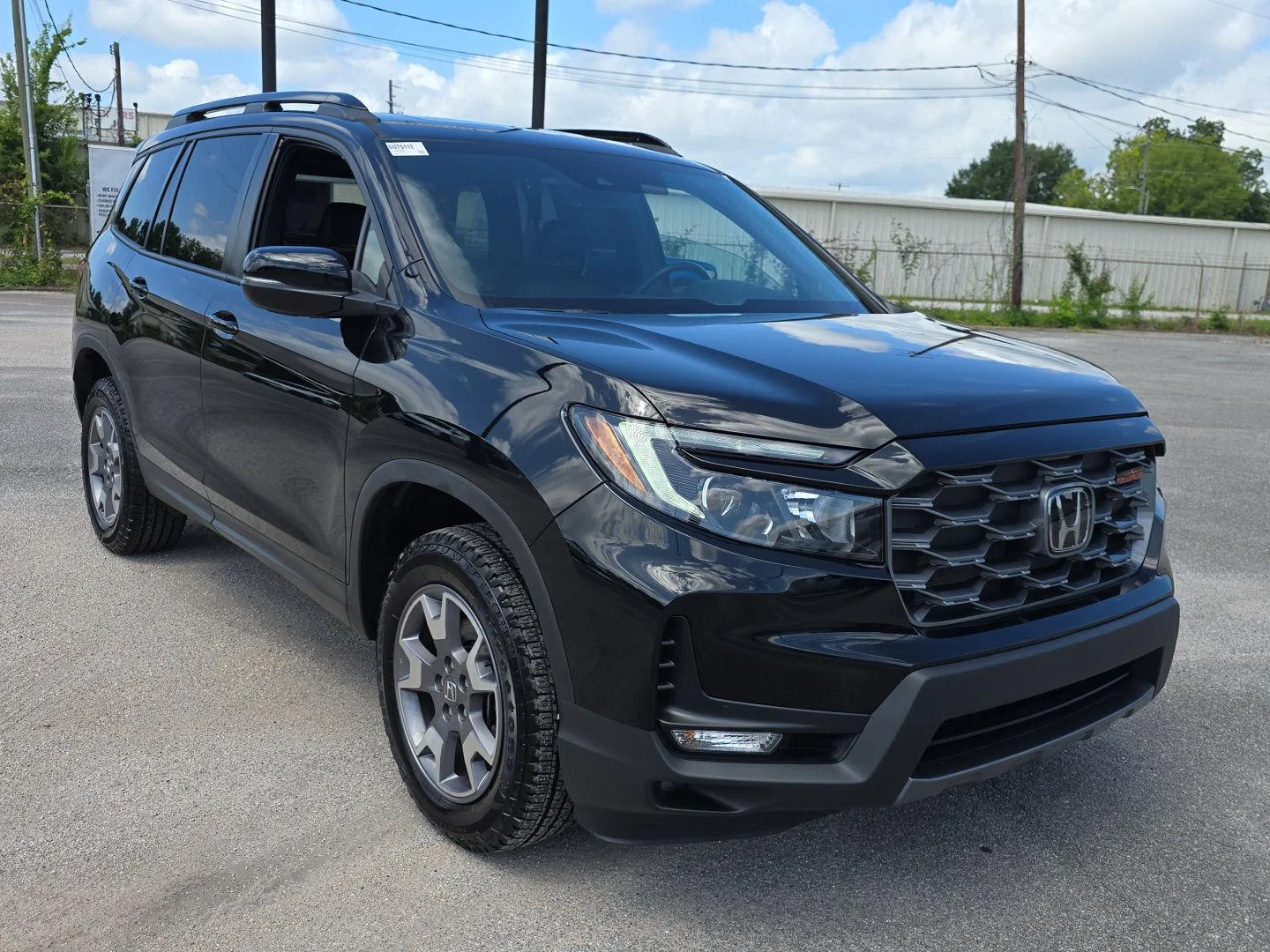 Used 2023 Crystal Black Pearl Honda TrailSport image 1