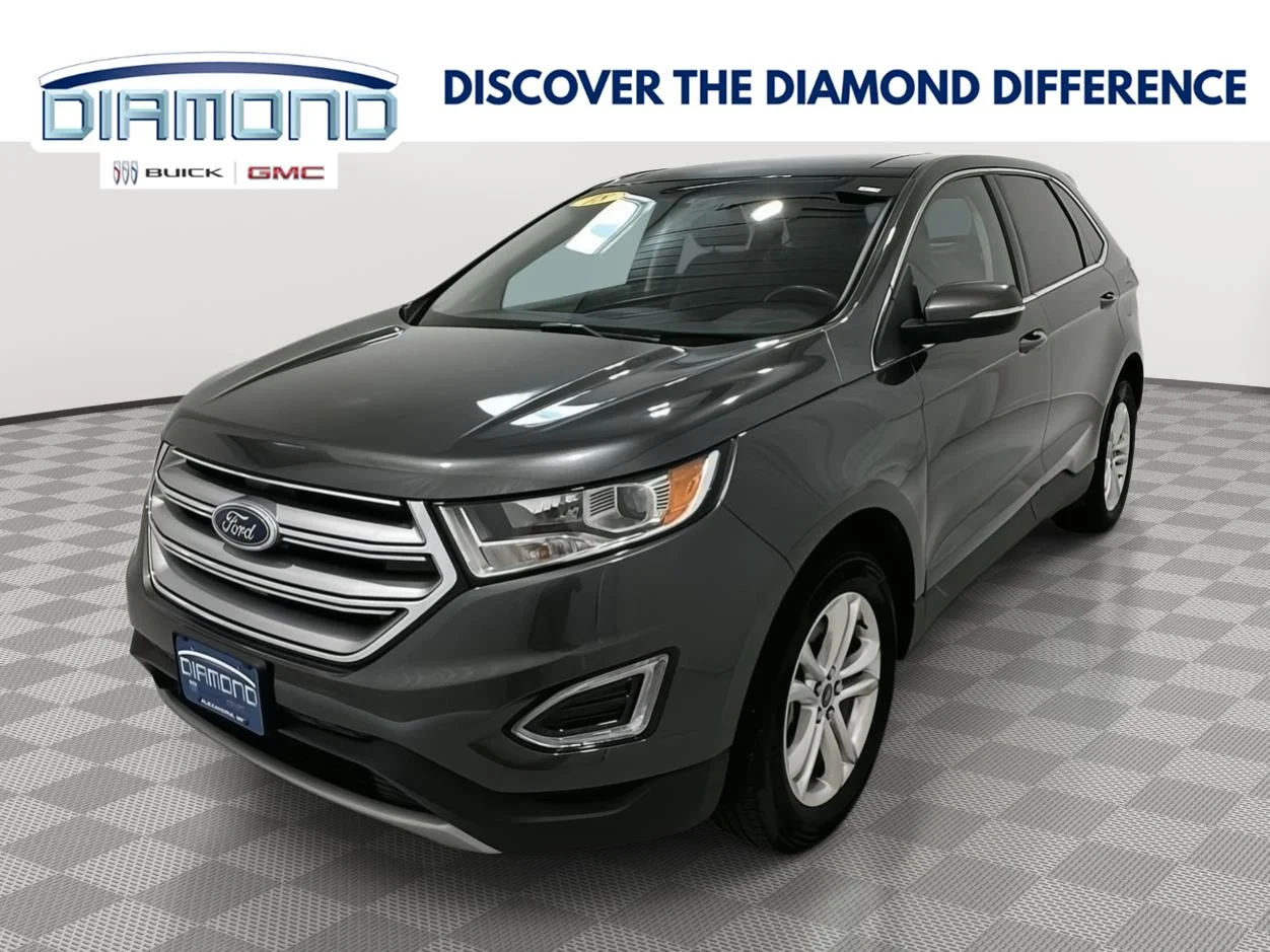 Used 2018 Magnetic Metallic Ford SEL image 1