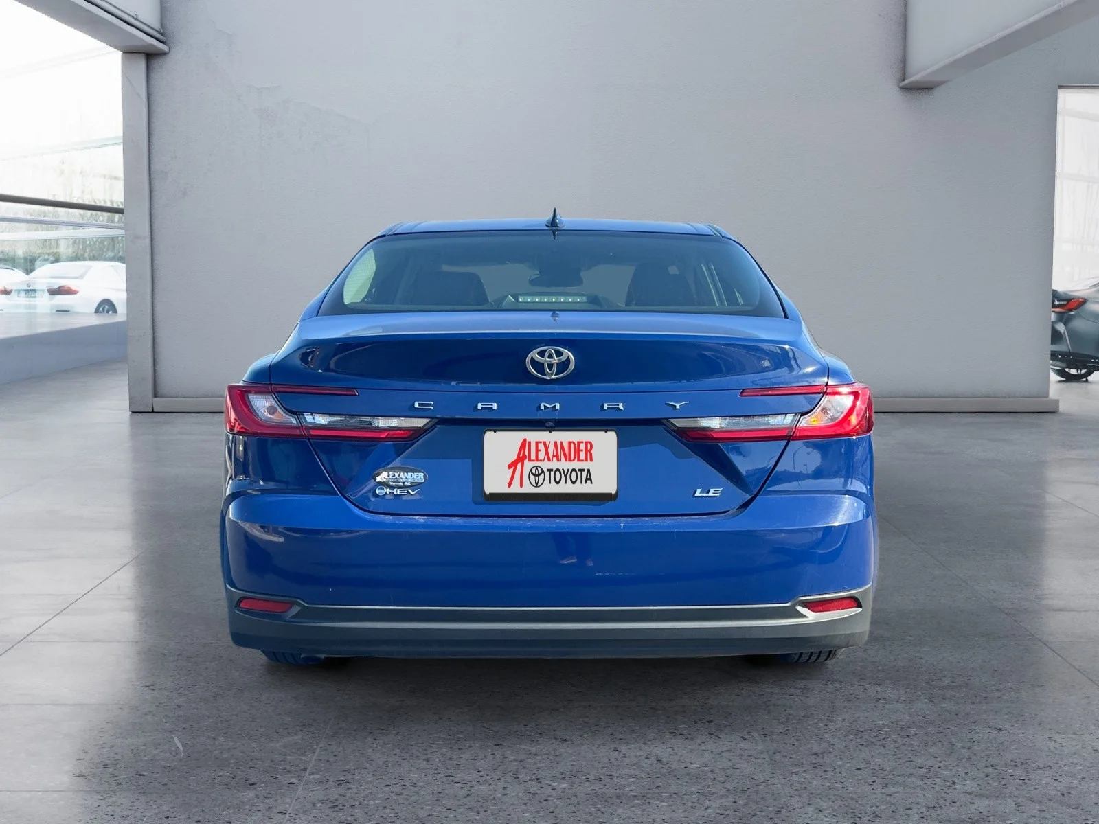 Used 2025 Reservoir Blue Toyota LE image 4