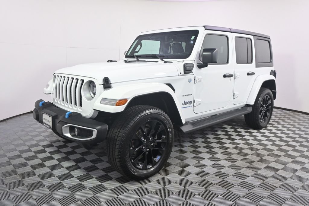 Used 2023 Jeep Wrangler 4xe Sahara 4XE with VIN 1C4JJXP61PW553817 for sale in St. Louis Park, Minnesota