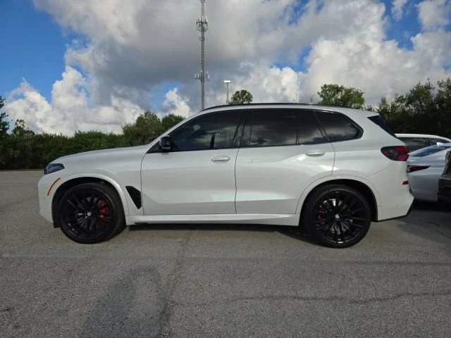 Used 2025 Mineral White Metallic BMW M60i image 2