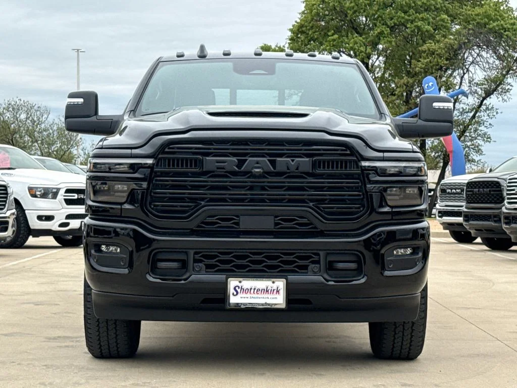 New 2026 Diamond Black Crystal Pearl-Coat Exterior Paint RAM Laramie image 2