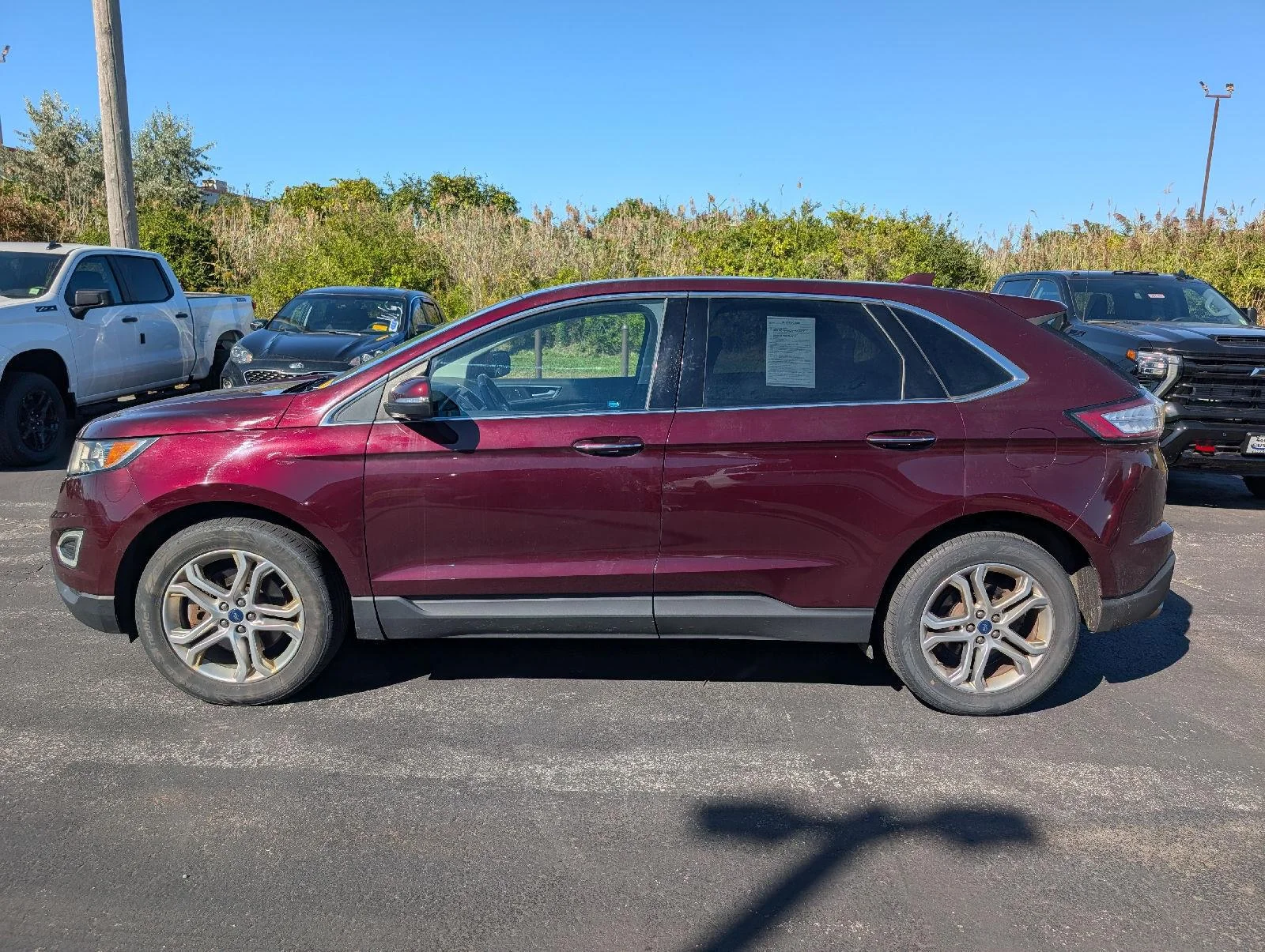 Used 2017 Burgundy Velvet Metallic Tinted Clearcoat Ford Titanium image 5