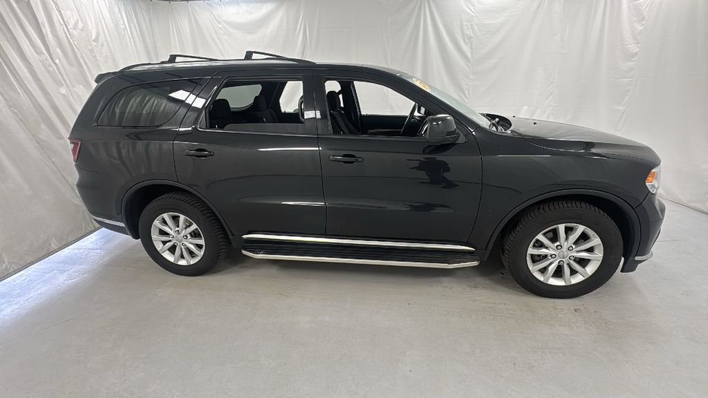 Used 2014 Dodge Durango SXT with VIN 1C4RDJAG6EC552315 for sale in Janesville, WI
