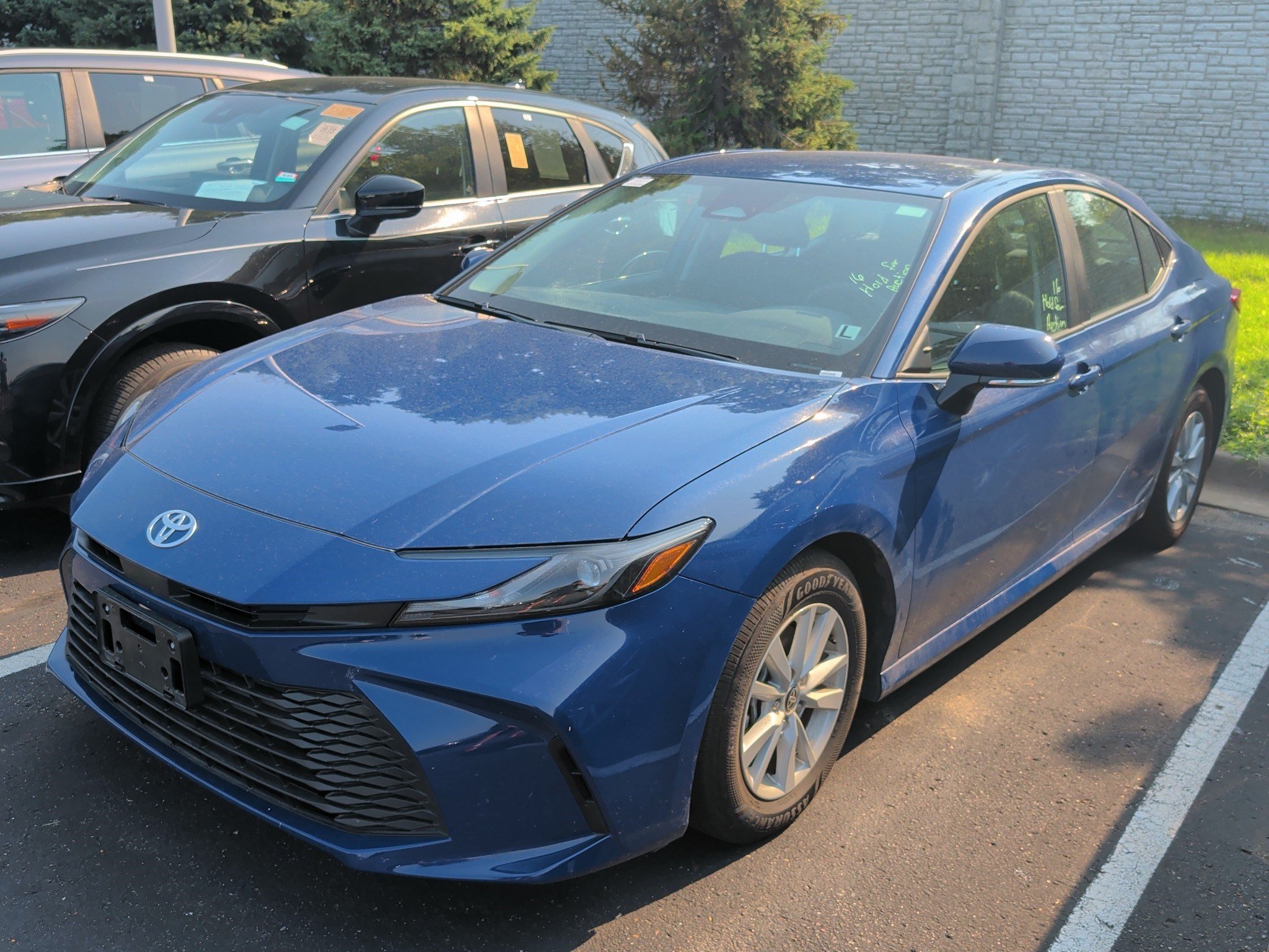 Used 2026 Reservoir Blue Toyota LE image 2