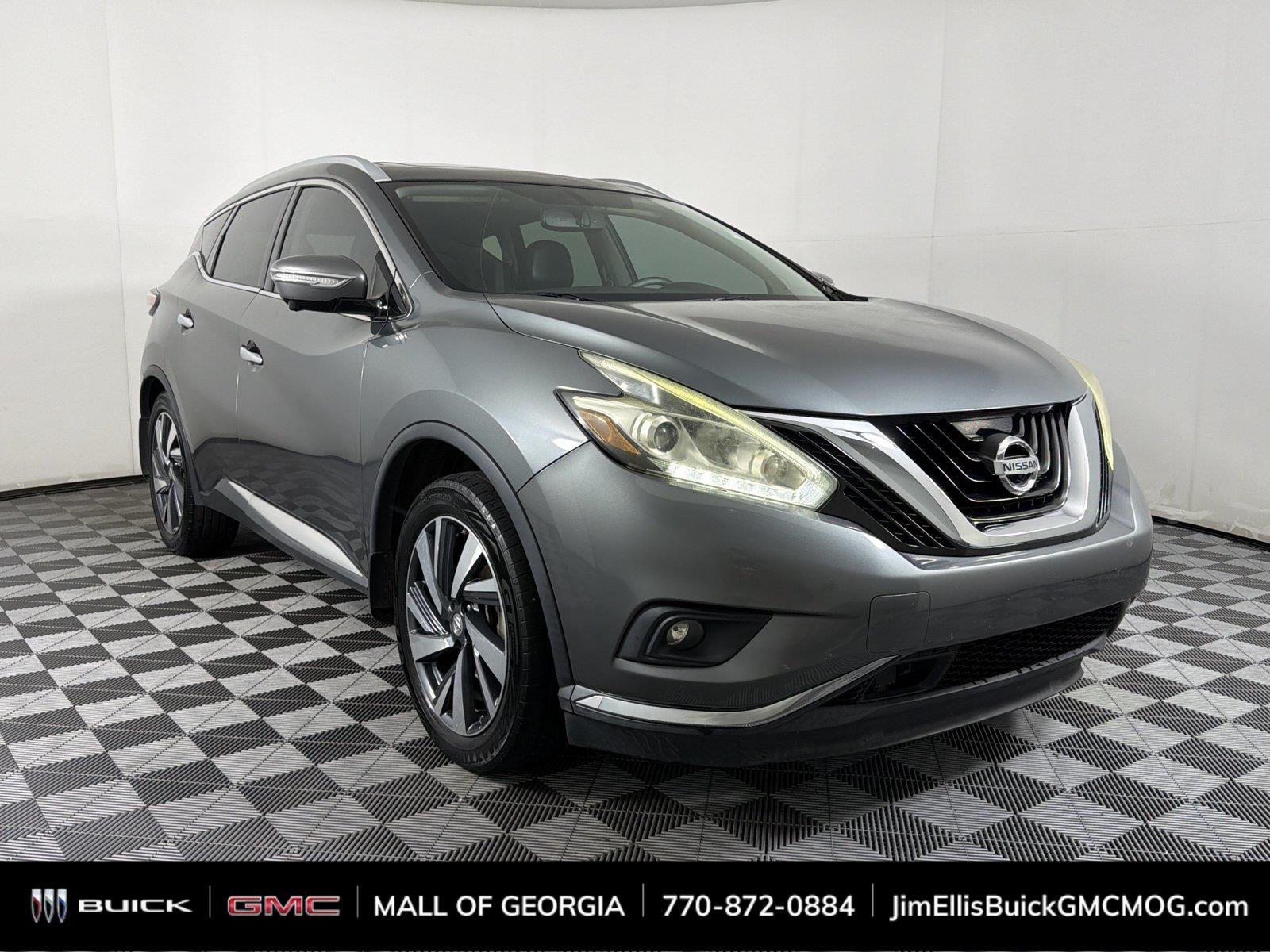 Used 2015 Gray Nissan Platinum image 1