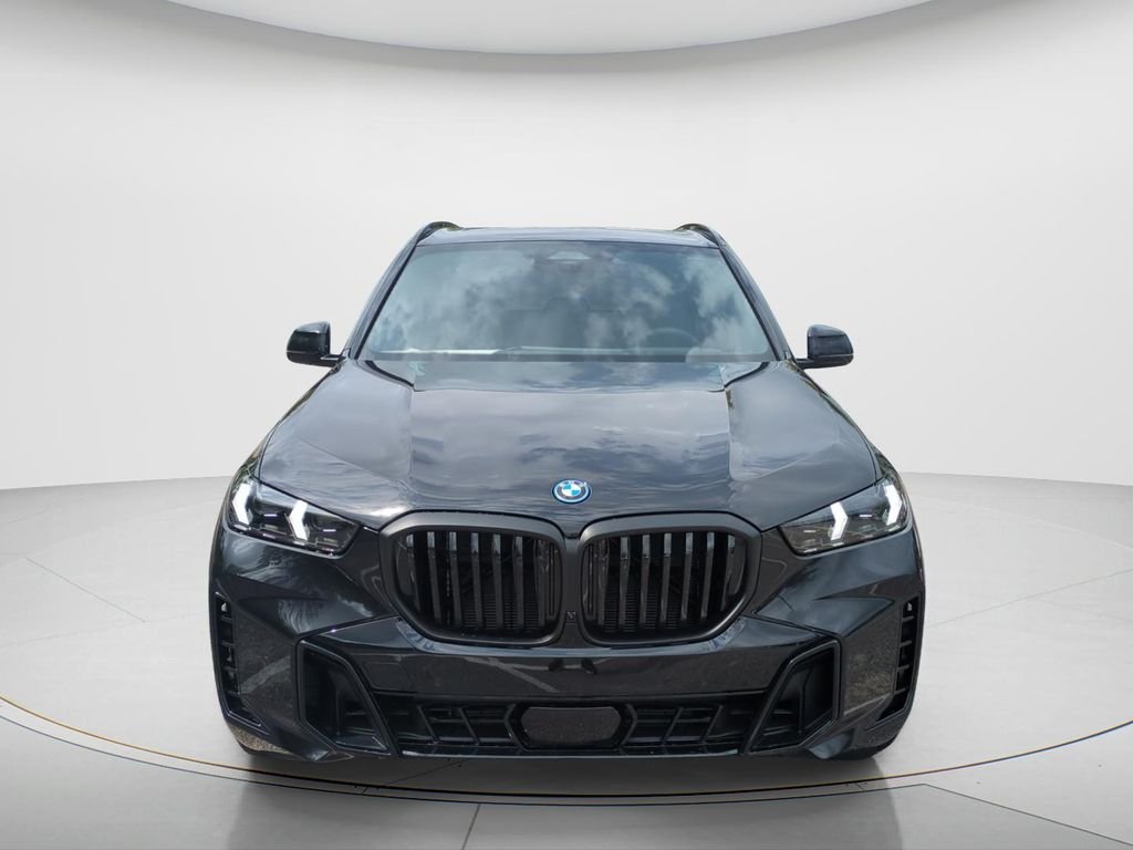 New 2026 Black Sapphire Metallic BMW xDrive50e image 16