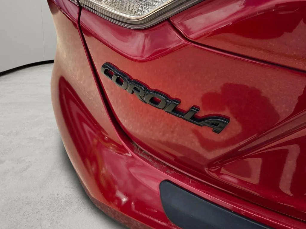 Used 2021 Barcelona Red Metallic Toyota LE image 18