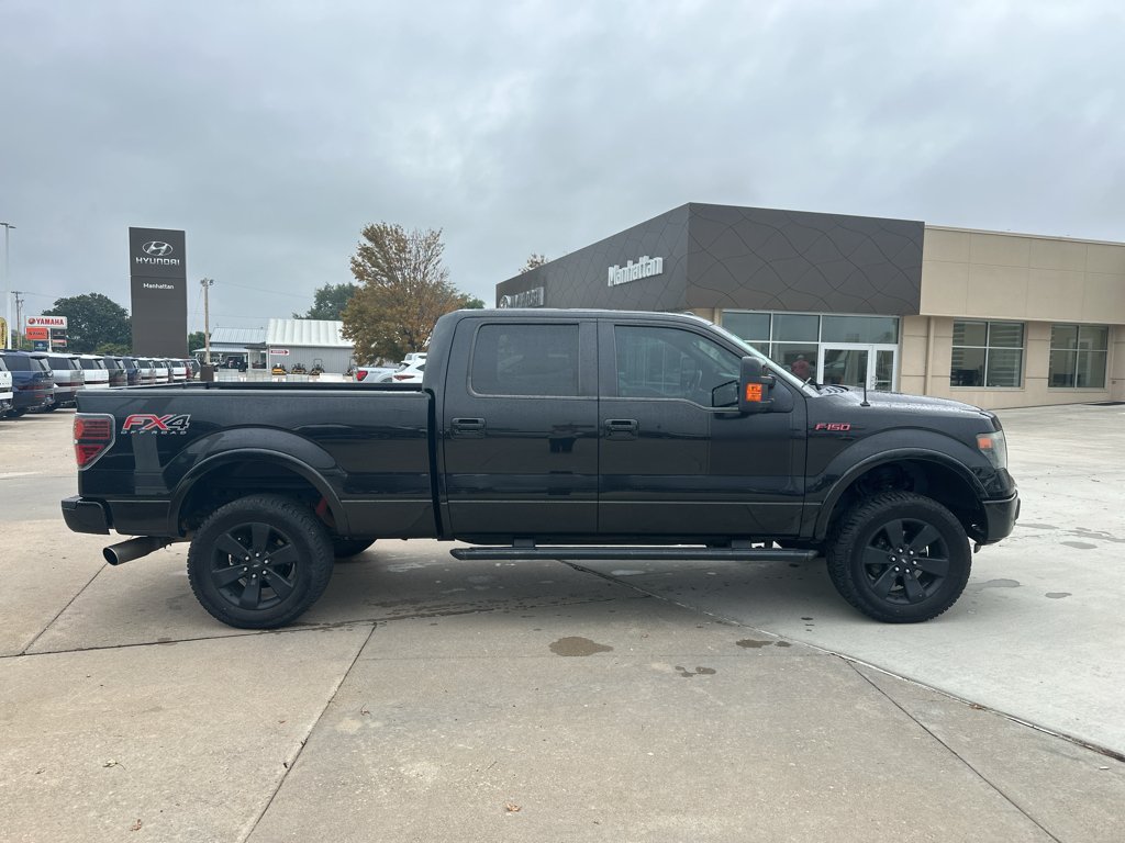 Used 2013 Tuxedo Black Metallic Ford FX4 image 13