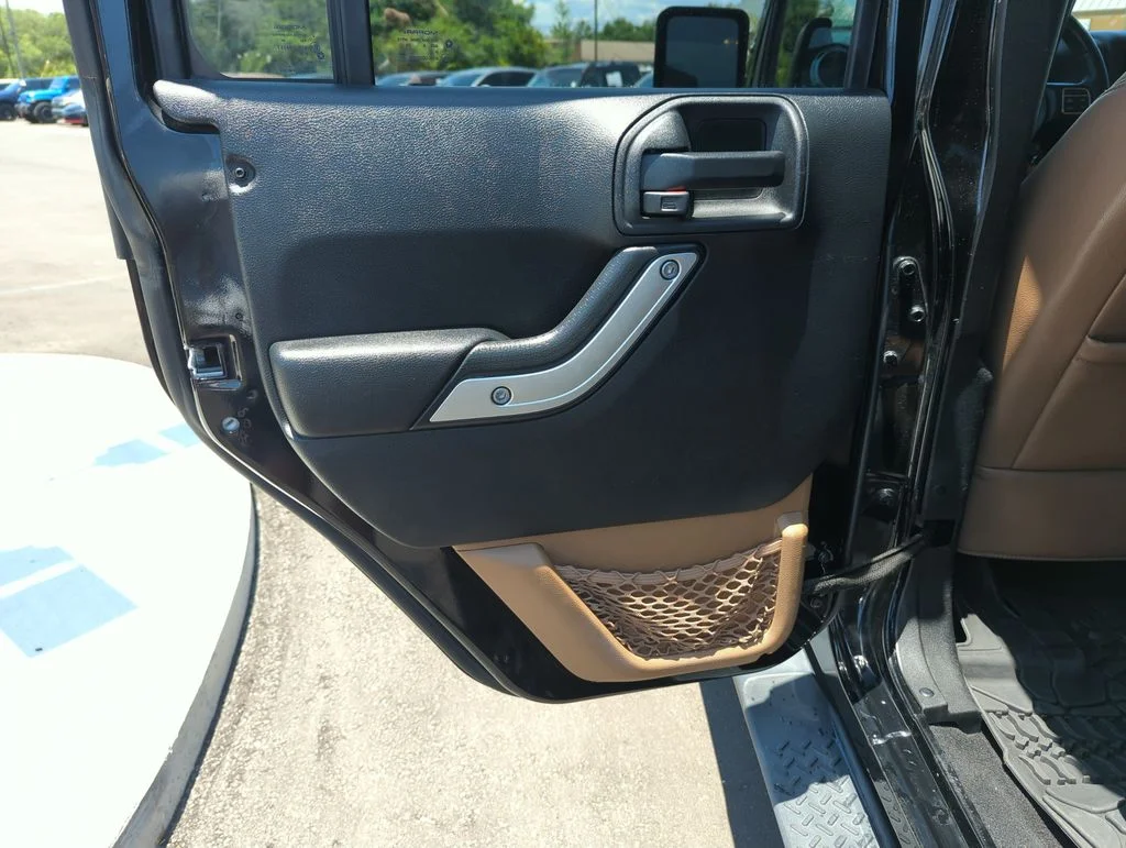 Used 2014 Black Jeep Unlimited Sahara image 25