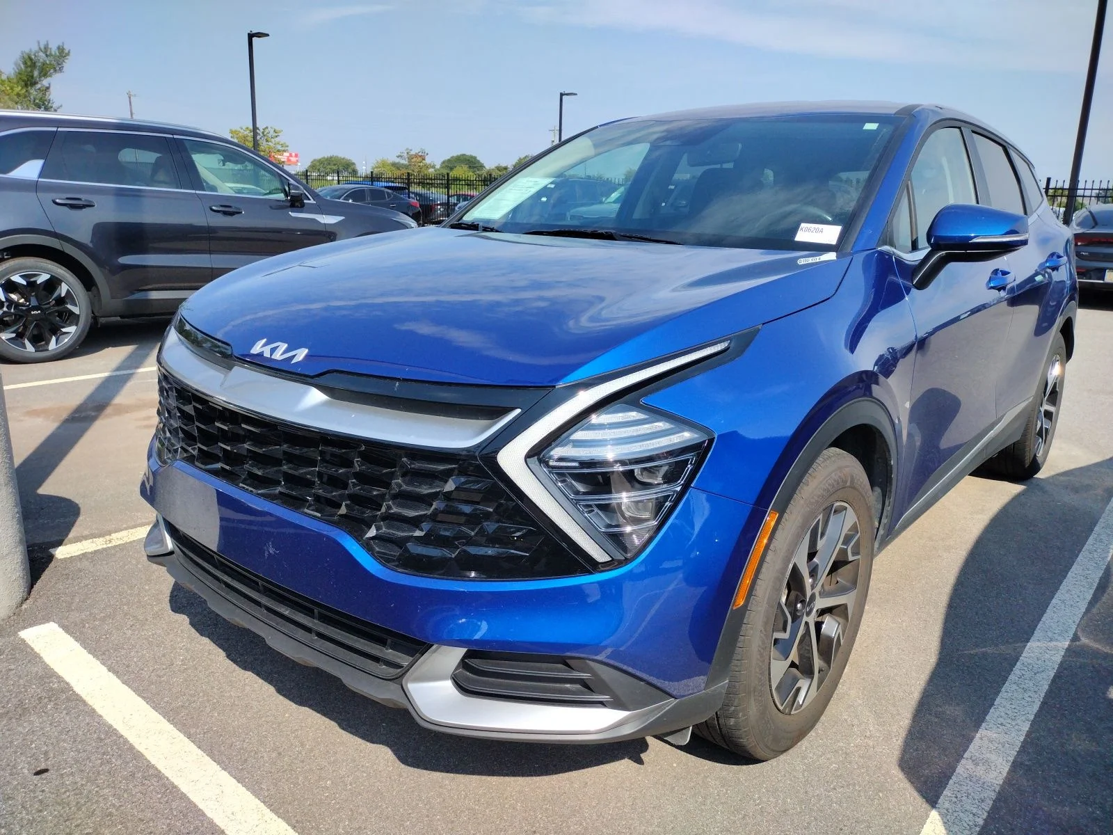 Used 2024 Blue Kia EX image 1