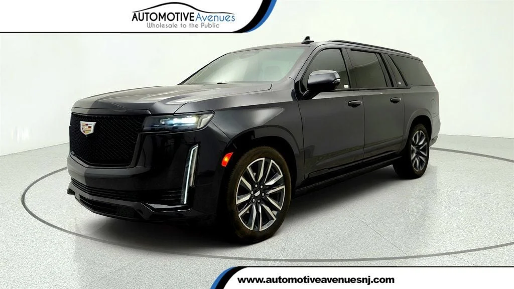 Used 2023 Galactic Gray Metallic Cadillac 4WD 4dr Sport w/ Touring Package & Retractable Steps image 1