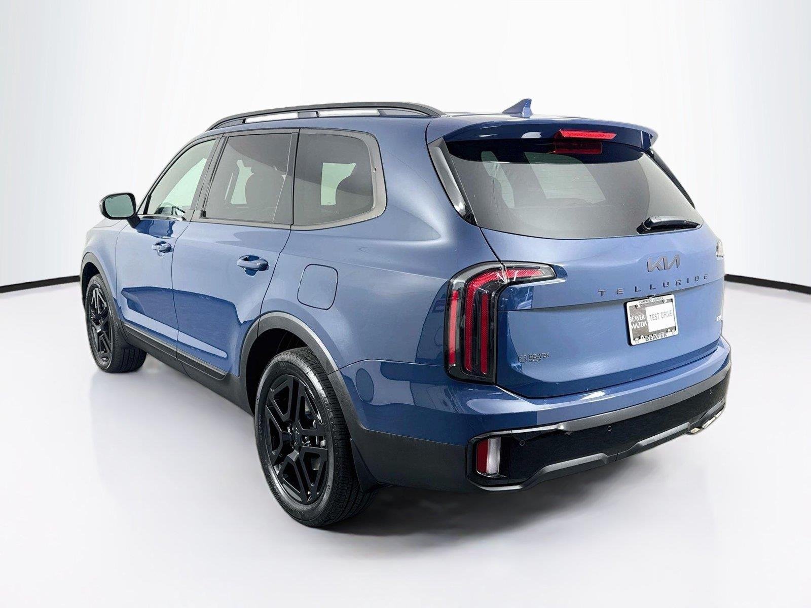 Used 2025 Midnight Lake Blue Kia EX X-Line image 13