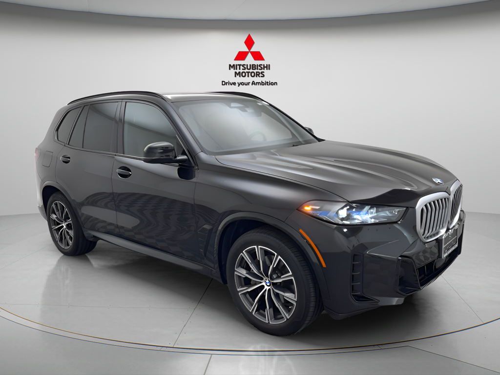Used 2026 Black Sapphire Metallic BMW xDrive40i M Sport image 3