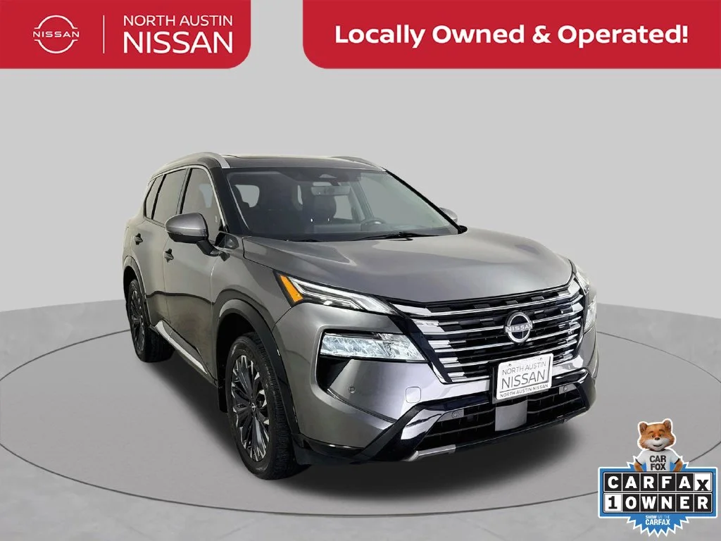 Used 2024 Gray Nissan Platinum image 1