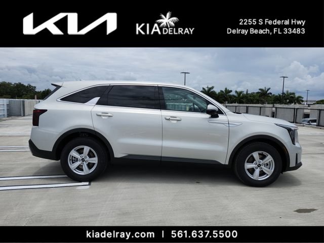 New 2026 Ivory Silver Kia LX image 2