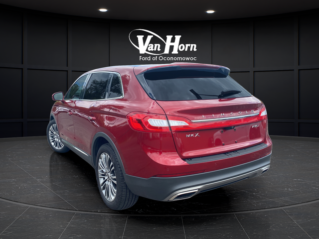 Used 2016 Ruby Red Metallic Lincoln Reserve image 5